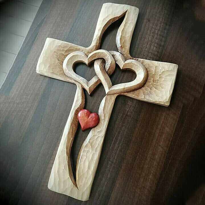Carved wooden cross - intertwined hearts